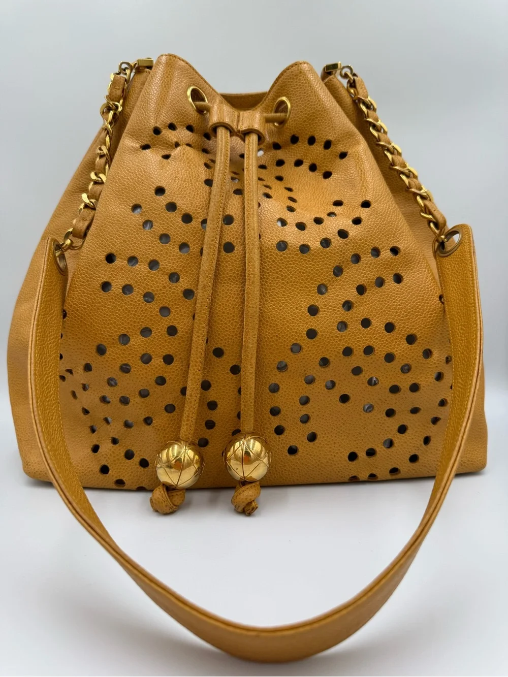 Chanel Perforated Drawstring Bucket Bag in Caviar Leather